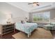 Bright main bedroom with large windows and walk-in closet at 12606 Fontana Loop, Bradenton, FL 34211