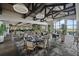 Bright and airy community clubhouse restaurant with large windows at 12606 Fontana Loop, Bradenton, FL 34211