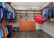 Large walk-in closet with ample shelving and hanging space at 12606 Fontana Loop, Bradenton, FL 34211
