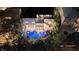 Night aerial view of house, pool and landscaping at 129 Mckinley Dr, Sarasota, FL 34236