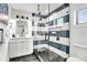 Modern bathroom with a large walk-in shower and stylish tile at 129 Mckinley Dr, Sarasota, FL 34236