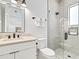 Modern bathroom with a single vanity and a glass shower at 129 Mckinley Dr, Sarasota, FL 34236