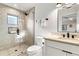 Clean bathroom with a toilet, vanity, and shower at 129 Mckinley Dr, Sarasota, FL 34236