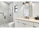 Clean bathroom with a single vanity and a walk-in shower at 129 Mckinley Dr, Sarasota, FL 34236