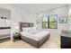 Bright and airy bedroom with a comfortable bed and en-suite bathroom at 129 Mckinley Dr, Sarasota, FL 34236