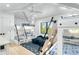 Bright bedroom with twin bunk beds, a window seat, and nautical-themed decor at 129 Mckinley Dr, Sarasota, FL 34236