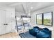 Well-lit bedroom featuring twin bunk beds and a relaxing atmosphere at 129 Mckinley Dr, Sarasota, FL 34236