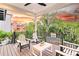 Relaxing deck with seating and sunset views at 129 Mckinley Dr, Sarasota, FL 34236