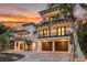 Three-story home with double garages and sunset view at 129 Mckinley Dr, Sarasota, FL 34236