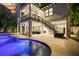 Backyard oasis with a pool, patio, and stairs at 129 Mckinley Dr, Sarasota, FL 34236