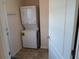 Convenient laundry room with stackable washer and dryer at 1564 Blind Brook Dr, Sarasota, FL 34234