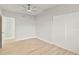 Bedroom with wood flooring and ceiling fan at 2108 30Th W Ave, Bradenton, FL 34205