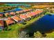 Community of lakefront homes with private pools and screened patios at 24160 Gallberry Dr, Venice, FL 34293