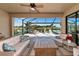Relaxing back patio with seating and water views at 24160 Gallberry Dr, Venice, FL 34293