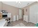 Bright bedroom with wood furniture and plenty of light at 24160 Gallberry Dr, Venice, FL 34293