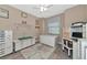 Spacious home office with built-in desk and cabinets at 24160 Gallberry Dr, Venice, FL 34293