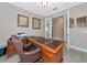 Home office with large desk and leather chair at 24160 Gallberry Dr, Venice, FL 34293