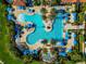 Expansive resort-style pool with plenty of lounge chairs at 24160 Gallberry Dr, Venice, FL 34293