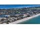 Aerial view of condo building near beach and waterway at 3240 Gulf Of Mexico Dr # B504, Longboat Key, FL 34228