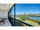 Relaxing balcony with water view and seating area at 3240 Gulf Of Mexico Dr # B504, Longboat Key, FL 34228