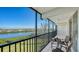 Spacious screened balcony overlooks the water at 3240 Gulf Of Mexico Dr # B504, Longboat Key, FL 34228