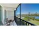 Spacious screened balcony overlooking the water at 3240 Gulf Of Mexico Dr # B504, Longboat Key, FL 34228