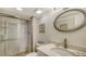Small bathroom with shower and updated vanity at 3240 Gulf Of Mexico Dr # B504, Longboat Key, FL 34228