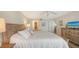 King-size bed, ensuite bathroom access, and plenty of light at 3240 Gulf Of Mexico Dr # B504, Longboat Key, FL 34228