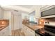 Updated kitchen with stainless steel appliances and tile at 3240 Gulf Of Mexico Dr # B504, Longboat Key, FL 34228