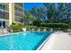 Refreshing community pool perfect for relaxing at 3240 Gulf Of Mexico Dr # B504, Longboat Key, FL 34228