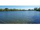 Scenic waterfront view with lush greenery at 3240 Gulf Of Mexico Dr # B504, Longboat Key, FL 34228