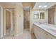 Double vanity bathroom with a separate shower and toilet at 3841 Albacete Cir # 51, Punta Gorda, FL 33950