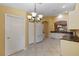 Kitchen with white cabinets, granite counters and island at 3841 Albacete Cir # 51, Punta Gorda, FL 33950