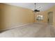 Living room with chandelier, ceiling fan and carpet at 3841 Albacete Cir # 51, Punta Gorda, FL 33950