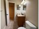 Main bathroom with vanity, toilet and access to bedroom at 4991 Village Gardens Dr # 41, Sarasota, FL 34234