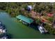 An aerial view of a boat dock on the water at 6161 Gulf Of Mexico Dr, Longboat Key, FL 34228