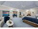 The spacious bedroom with balcony access showcases breathtaking ocean views, complemented by elegant furnishings and natural light at 6161 Gulf Of Mexico Dr, Longboat Key, FL 34228