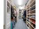 Massive walk-in closet offers ample shelving, hanging space, and plenty of room for storage at 6161 Gulf Of Mexico Dr, Longboat Key, FL 34228