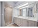 Bathroom with double vanity and shower stall at 6200 Saddle Oak Trl, Sarasota, FL 34241