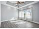 Serene bedroom with wood floors and plenty of natural light at 6200 Saddle Oak Trl, Sarasota, FL 34241