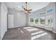 Bright bedroom featuring wood flooring and a window seat at 6200 Saddle Oak Trl, Sarasota, FL 34241