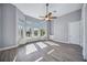 Sunlit bedroom with wood floors and built in window seat at 6200 Saddle Oak Trl, Sarasota, FL 34241