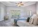 Spacious main bedroom with pool view and large sliding glass doors at 6200 Saddle Oak Trl, Sarasota, FL 34241