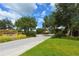 Entrance to Saddle Oak Estates with signage and landscaping at 6200 Saddle Oak Trl, Sarasota, FL 34241