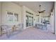 Spacious covered patio with seating area, perfect for outdoor dining and relaxation at 6200 Saddle Oak Trl, Sarasota, FL 34241