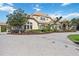 Beautiful home with a large driveway and manicured landscaping at 6200 Saddle Oak Trl, Sarasota, FL 34241