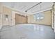 Large garage with ample storage, overhead storage, and a side door at 6200 Saddle Oak Trl, Sarasota, FL 34241