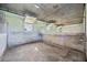 Interior of a horse stall with concrete floor and metal bars at 6200 Saddle Oak Trl, Sarasota, FL 34241