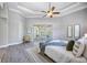 Main bedroom with pool view and sliding glass doors at 6200 Saddle Oak Trl, Sarasota, FL 34241