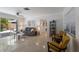 Bright and airy living room featuring modern furniture and terrazzo floors, with a view to the backyard at 671 47Th St, Sarasota, FL 34234